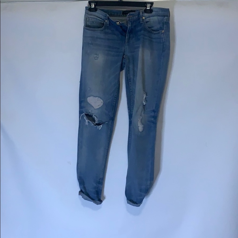 light blue ripped jeans